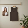 A U-neck vest with a halter top for women in summer, worn as an outer layer and an inner layer to prevent exposure. It is a white top with a threaded cotton base made of milk and yogurt. 101038619 details Picture